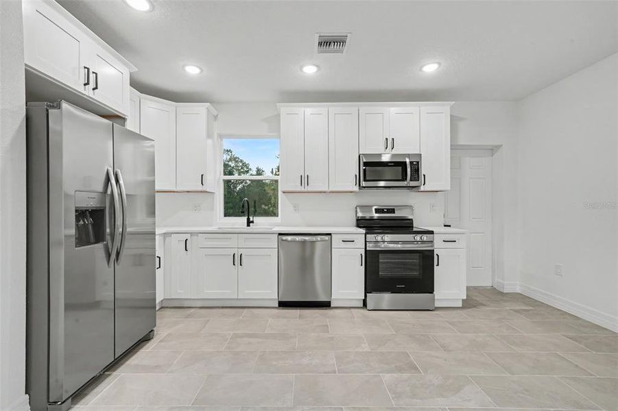 Furnished interior view inside a new home in , Avon Park (Image 6).
