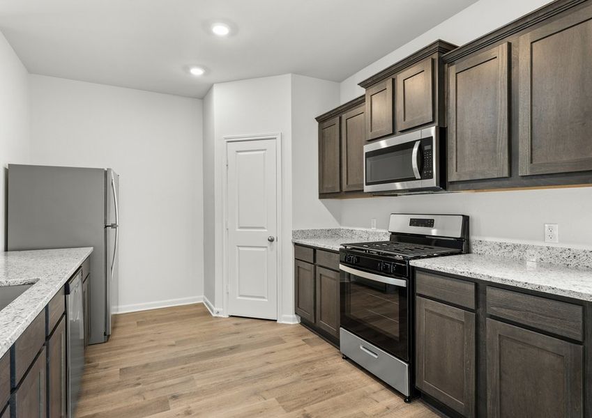 The kitchen has gorgeous wood cabinetry. The kitchen has gorgeous wood cabinetry.