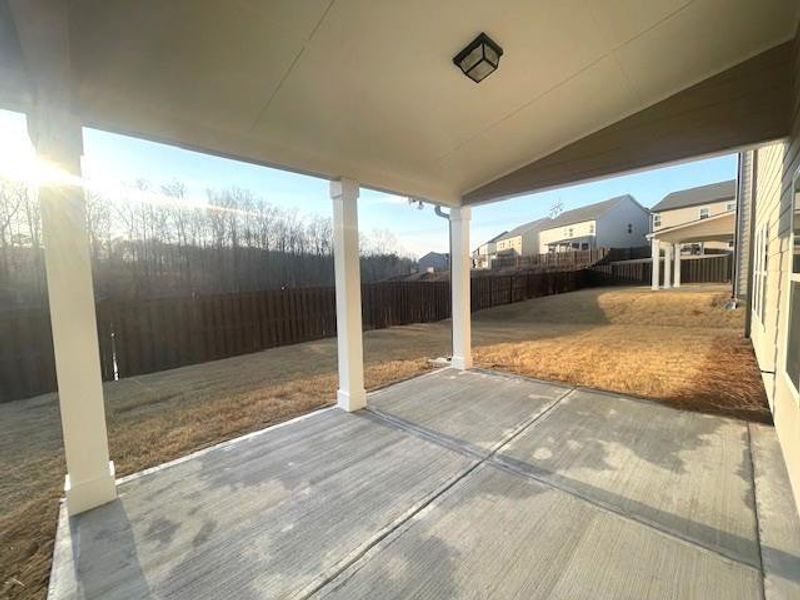 Exterior details and patio area of a home in Ponderosa Farms Estates, Gainesville (Image 4).