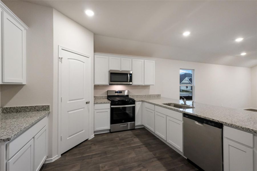 Furnished interior view inside a new home in Watermill, Uhland (Image 3).
