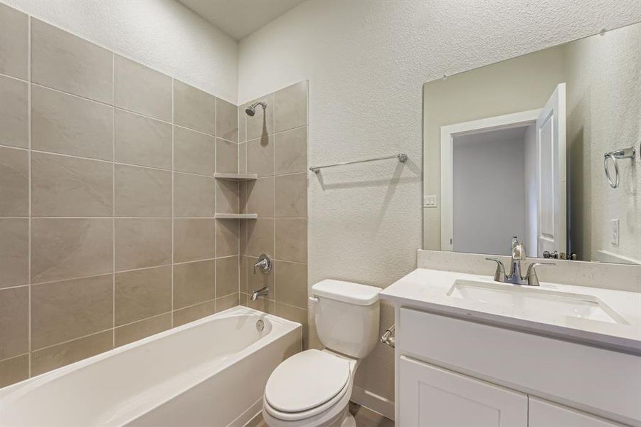 Furnished interior view inside a new home in MiraVerde, Crowley (Image 9).
