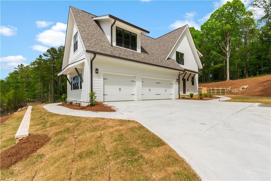 Front exterior of a new home in , Rydal, GA, highlighting curb appeal (Image 23). Front exterior of a new home in , Rydal, GA, highlighting curb appeal (Image 23).