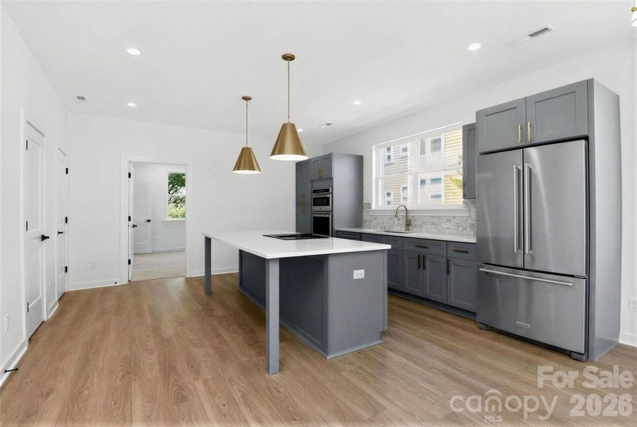 Kitchen refrigerator virtually added for effect.