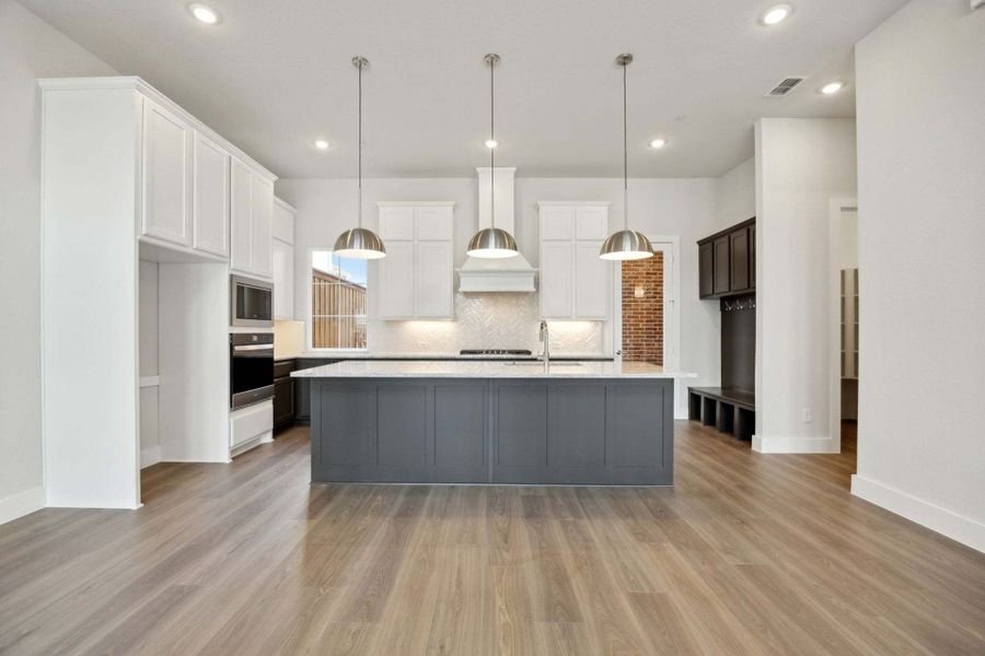 Furnished interior view inside a new home in Newman Village Townhomes, Frisco (Image 8).