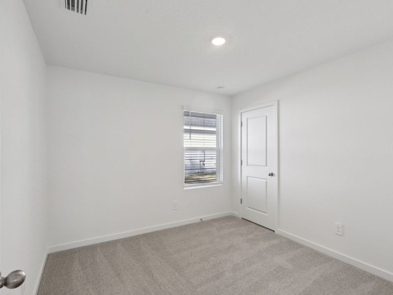 Spacious, unfurnished interior of a new home in Flagler Village - Classic Series, Palm Coast (Image 10).