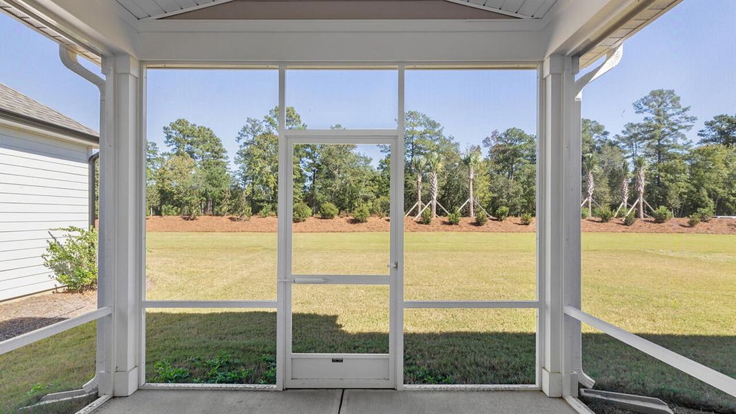 Exterior details and patio area of a home in Indigo Preserve, Leland (Image 3).