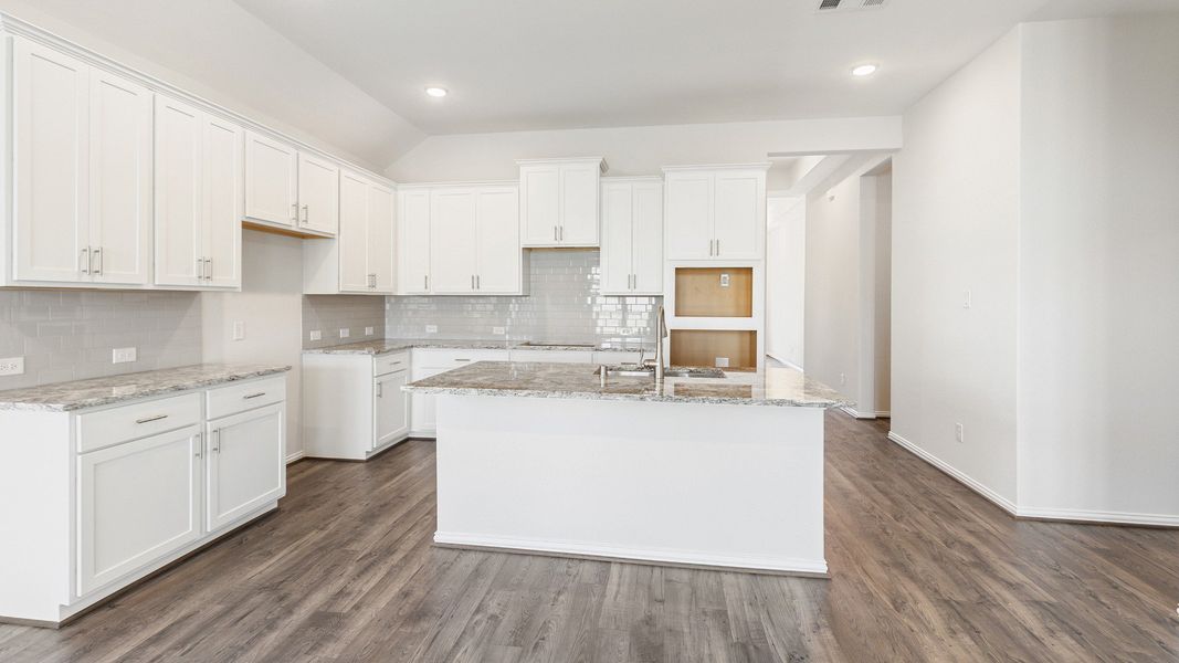 Furnished interior view inside a new home in Sunterra, Katy (Image 17).