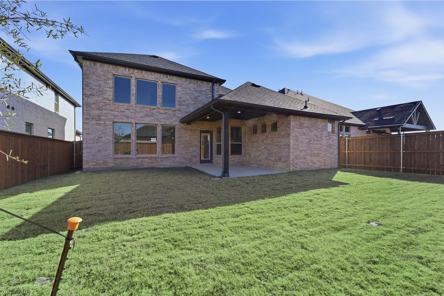 Exterior details and patio area of a home in La Terra, Celina (Image 3). Exterior details and patio area of a home in La Terra, Celina (Image 3).