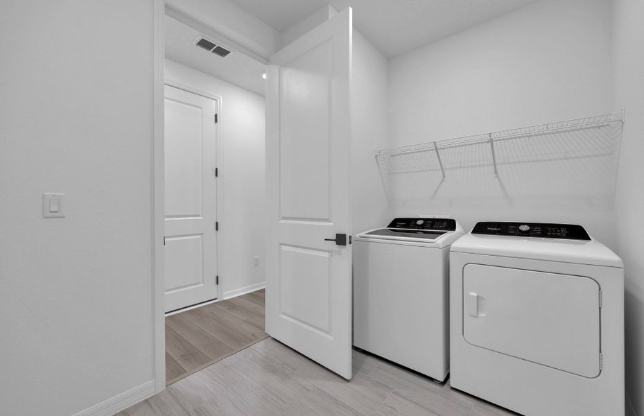 Furnished interior view inside a new home in Hyland Trail, Green Cove Springs (Image 9).