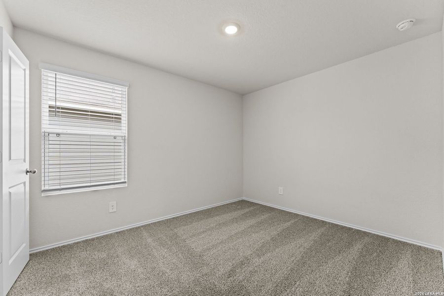Spacious, unfurnished interior of a new home in Navarro Fields, Seguin (Image 12).