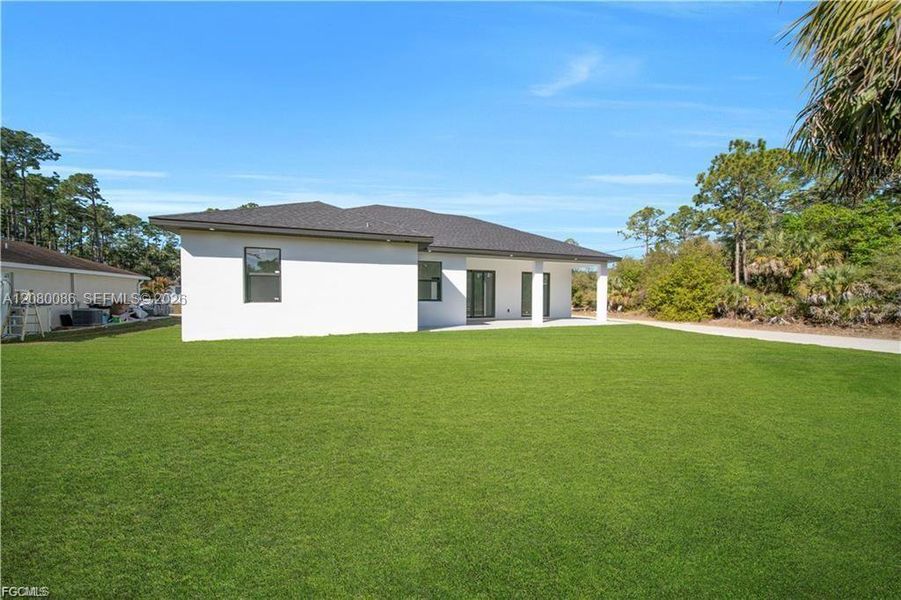Exterior details and patio area of a home in , Lehigh Acres (Image 3).