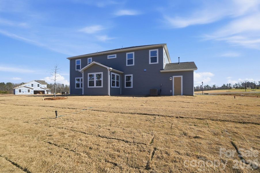 Exterior details and patio area of a home in Blair Place, Monroe (Image 3).