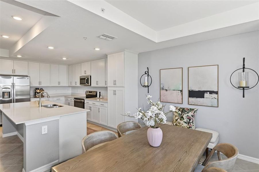 Furnished interior view inside a new home in Wellen Park Golf & Country Club, Venice (Image 32).