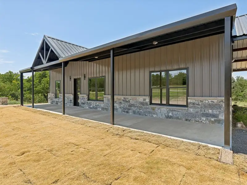 Exterior details and patio area of a home in , Alvord (Image 2). Exterior details and patio area of a home in , Alvord (Image 2).