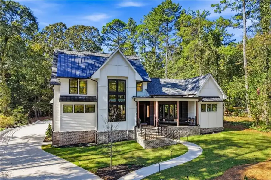 Front exterior of a new home in , Fayetteville, GA, highlighting curb appeal (Image 2). Front exterior of a new home in , Fayetteville, GA, highlighting curb appeal (Image 2).