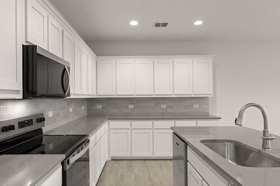 Representative exterior photo of a completed home built from the Phoenix by Impression Homes in Terra Vella, Haslet, TX (Image 6).