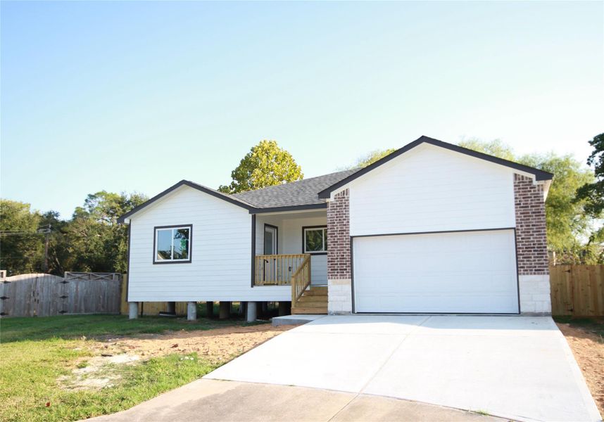 Front exterior of a new home in , Houston, TX, highlighting curb appeal (Image 14). Front exterior of a new home in , Houston, TX, highlighting curb appeal (Image 14).