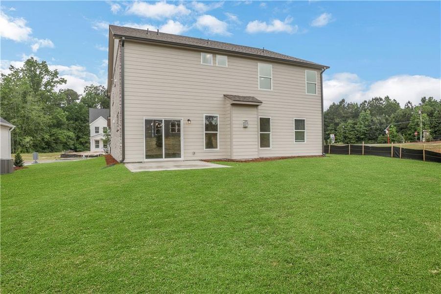 Exterior details and patio area of a home in , Loganville (Image 25).