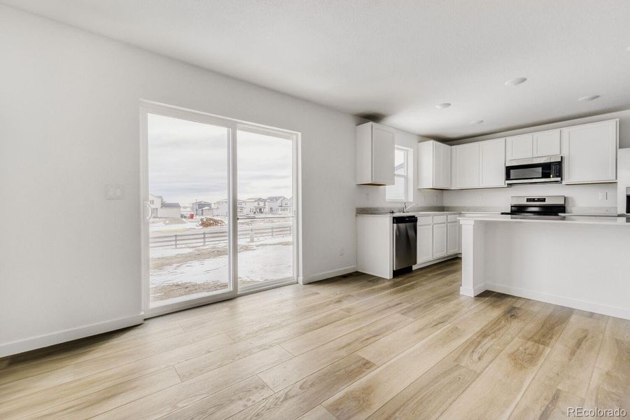 Spacious, unfurnished interior of a new home in Percheron: The Camden Collection, Colorado Springs (Image 11).