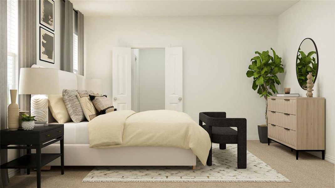 Bedroom featuring light colored carpet