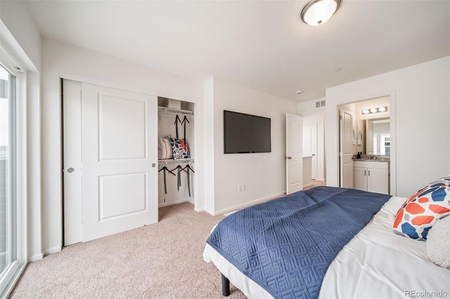 Furnished interior view inside a new home in Reunion, Commerce City (Image 34).