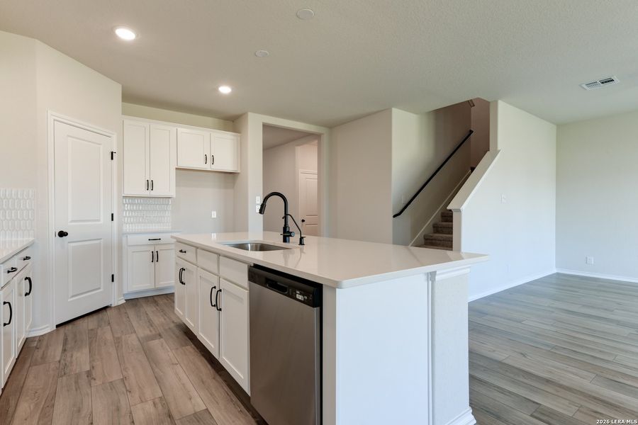 Furnished interior view inside a new home in Hennersby Hollow, San Antonio (Image 4).