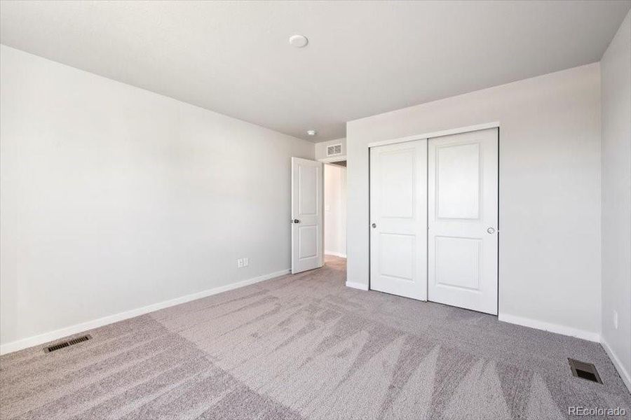 Spacious, unfurnished interior of a new home in The Boulevard II Collection at Windler, Aurora (Image 19).