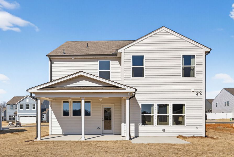 Exterior details and patio area of a home in Benson Village, Benson (Image 2).