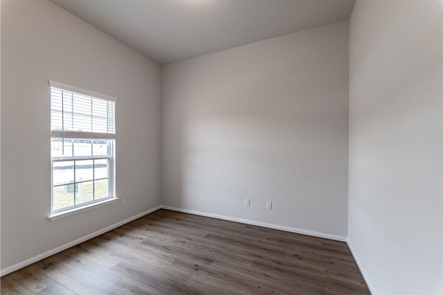 Spacious, unfurnished interior of a new home in The Woodlands at Medina Hills, Mico (Image 13).