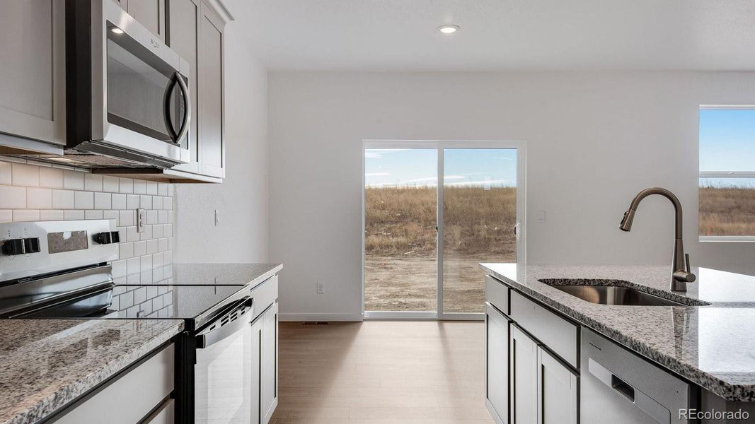 Furnished interior view inside a new home in Settlers Crossing, Commerce City (Image 5).