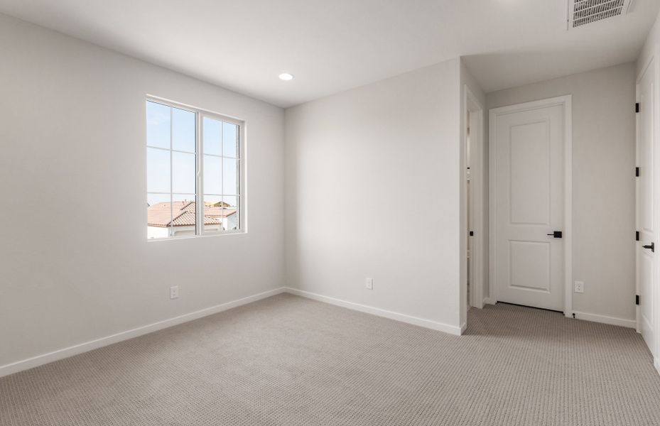 Spacious, unfurnished interior of a new home in Legado West, Queen Creek (Image 28).