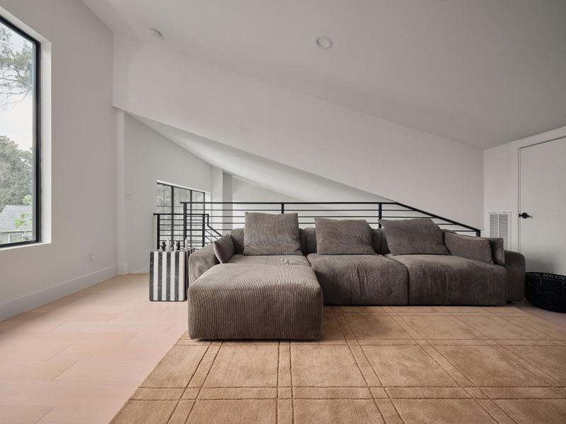 Versatile loft space that can serve as 4th bedroom