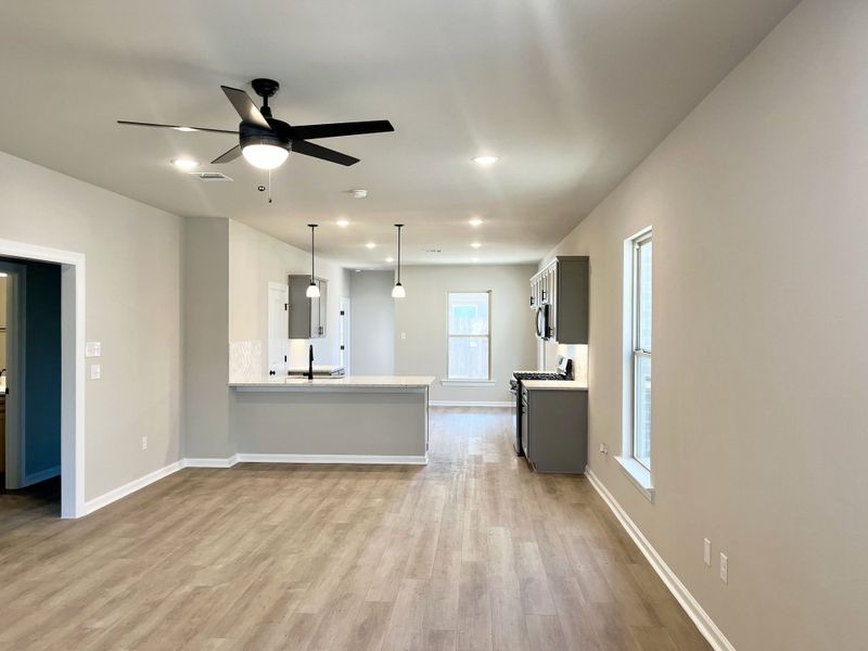 Front exterior of a new home in Emberly, Beasley, TX, highlighting curb appeal (Image 7).