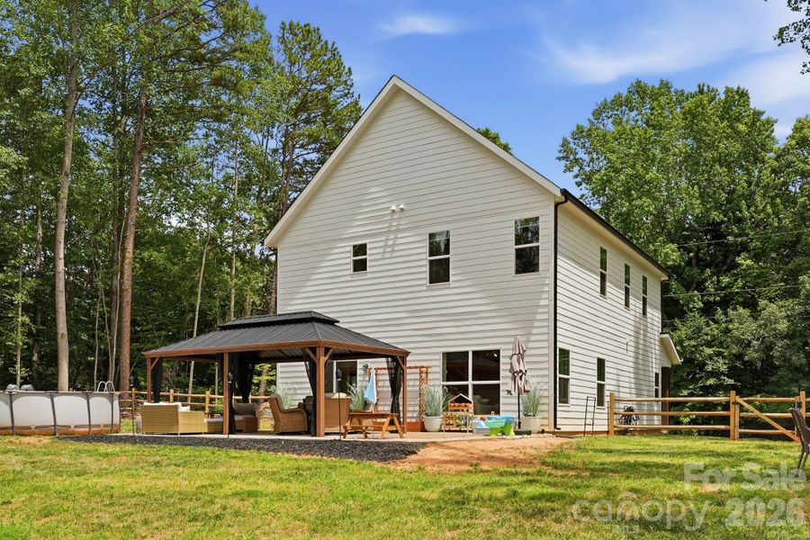 Exterior details and patio area of a home in , Troutman (Image 3).