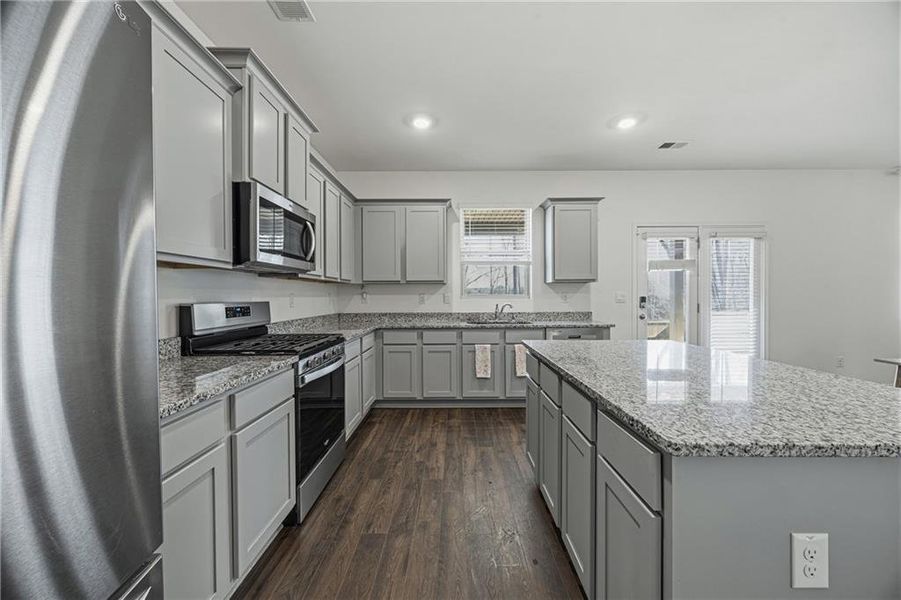 Furnished interior view inside a new home in The Enclave at Flat Rock Hills, Stonecrest (Image 13).