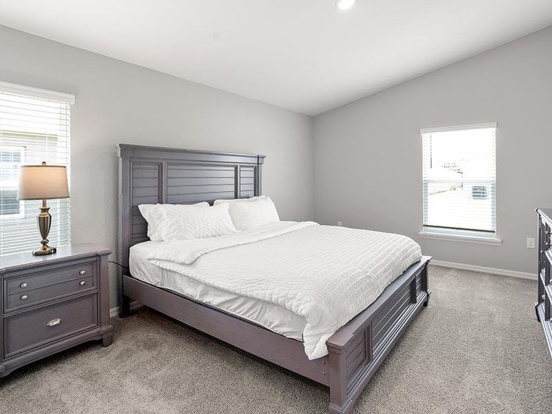 Enjoy a spacious owner`s suite with volume ceilings.