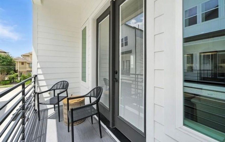 Exterior details and patio area of a home in , Houston (Image 2).