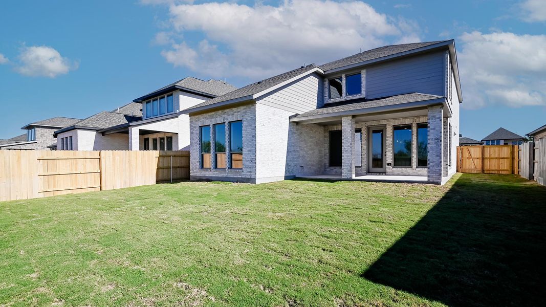 Exterior details and patio area of a home in Crosswinds 50', Kyle (Image 17).