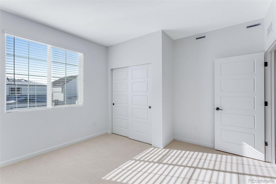 Spacious, unfurnished interior of a new home in Westside Crossing, Berthoud (Image 28).