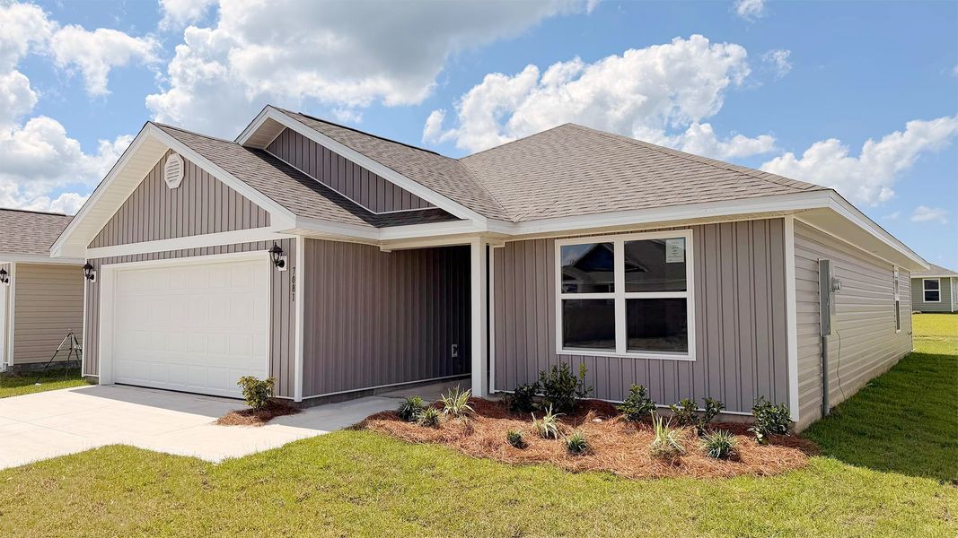 Front exterior of a new home in Liberty, Panama City, FL, highlighting curb appeal (Image 2). Front exterior of a new home in Liberty, Panama City, FL, highlighting curb appeal (Image 2).