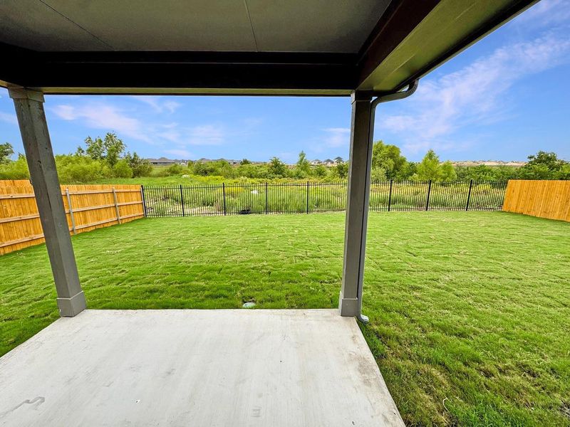 Exterior details and patio area of a home in Prairie Winds, Hutto (Image 3).