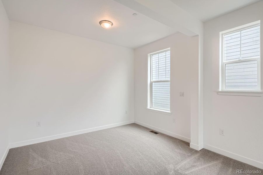 Spacious, unfurnished interior of a new home in Sunset Village: The Grand Collection, Erie (Image 17). Spacious, unfurnished interior of a new home in Sunset Village: The Grand Collection, Erie (Image 17).