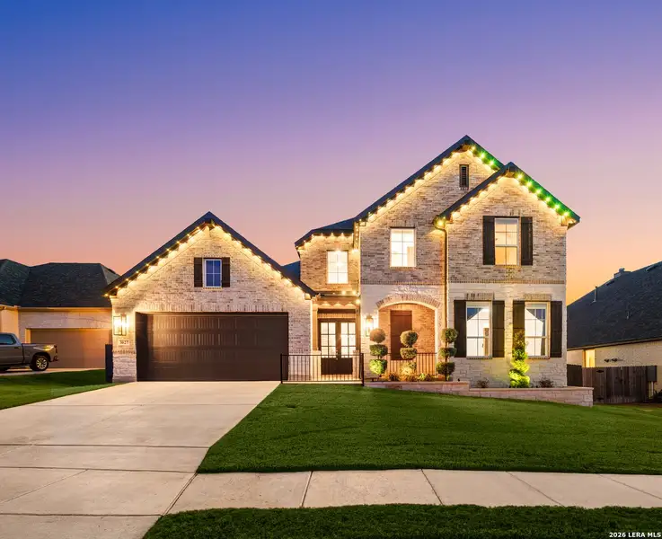 Front exterior of a new home in Ventana, Bulverde, TX, highlighting curb appeal (Image 27).