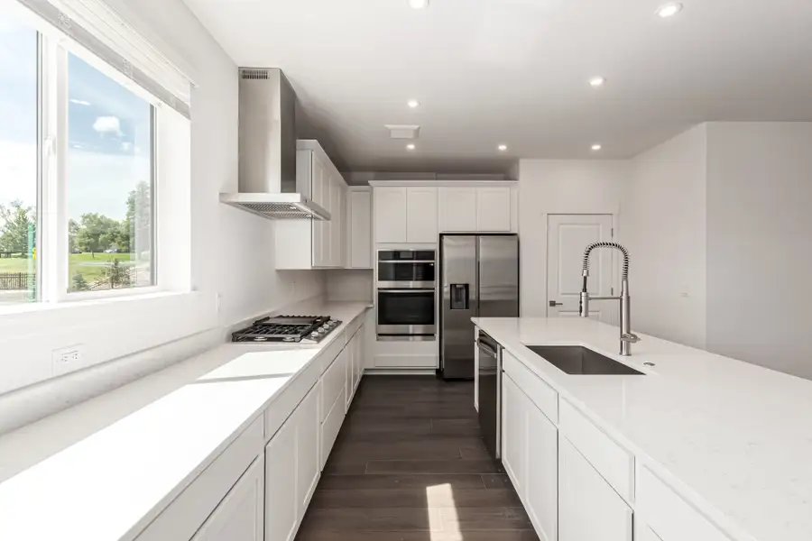 Furnished interior view inside a new home in Ascent at Inverness, Englewood (Image 3).