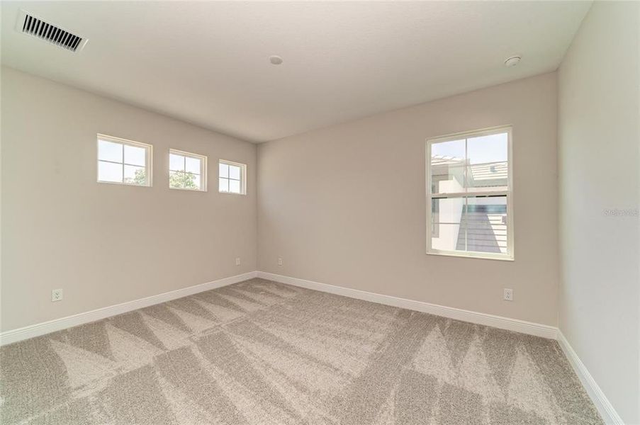Spacious, unfurnished interior of a new home in Hidden Lakes, Brandon (Image 45).