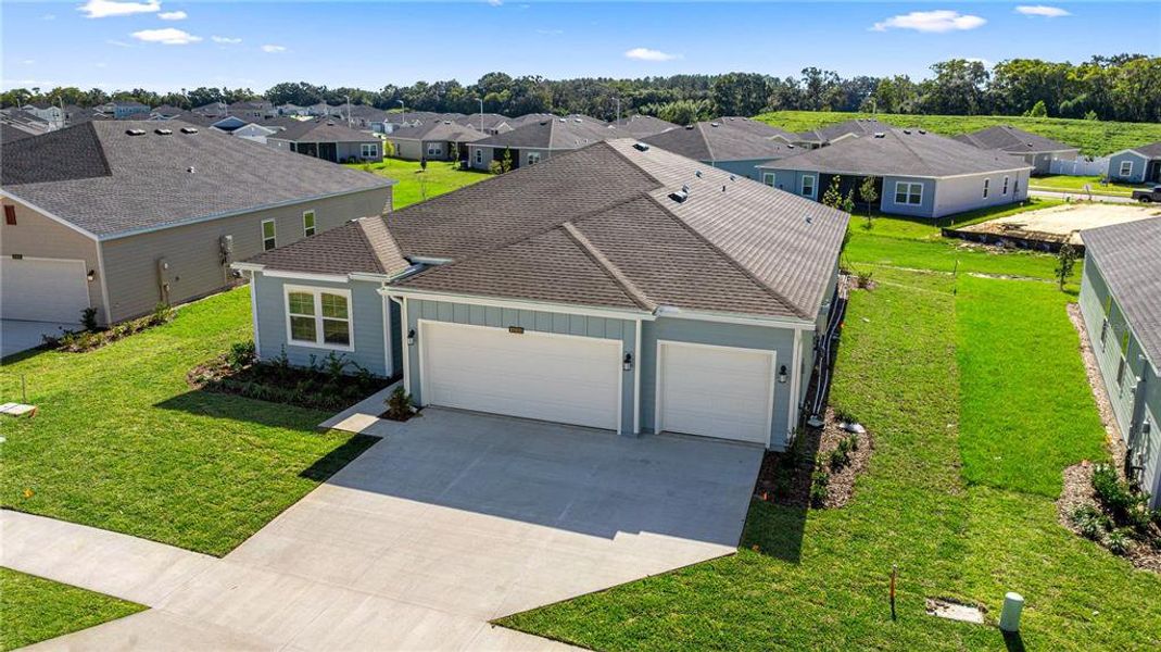 Front exterior of a new home in Pioneer Ranch, Ocala, FL, highlighting curb appeal (Image 3).