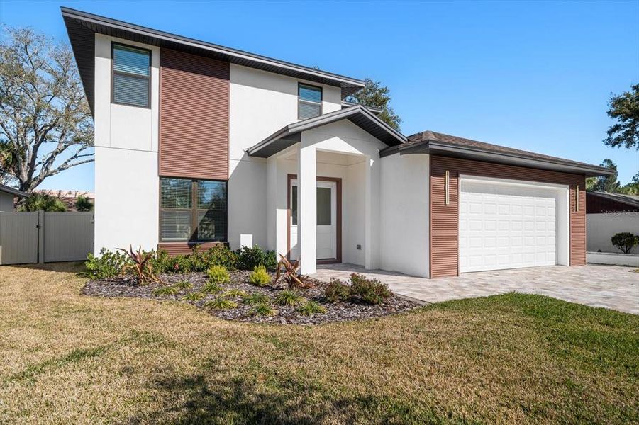 Front exterior of a new home in , Largo, FL, highlighting curb appeal (Image 27).