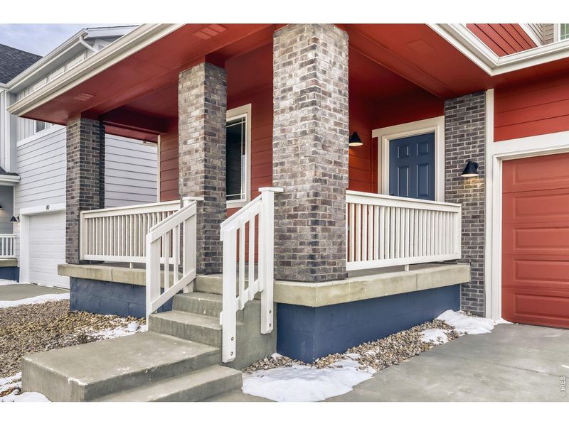 Exterior details and patio area of a home in Farmstead, Berthoud (Image 27).