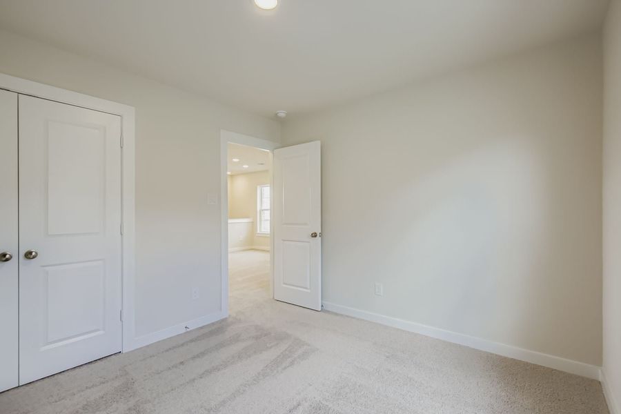 A room with white doors.