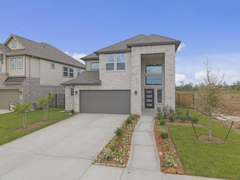 Representative exterior photo of a completed home built from the Durango by Chesmar Homes in Sienna 45', Missouri City, TX (Image 20).